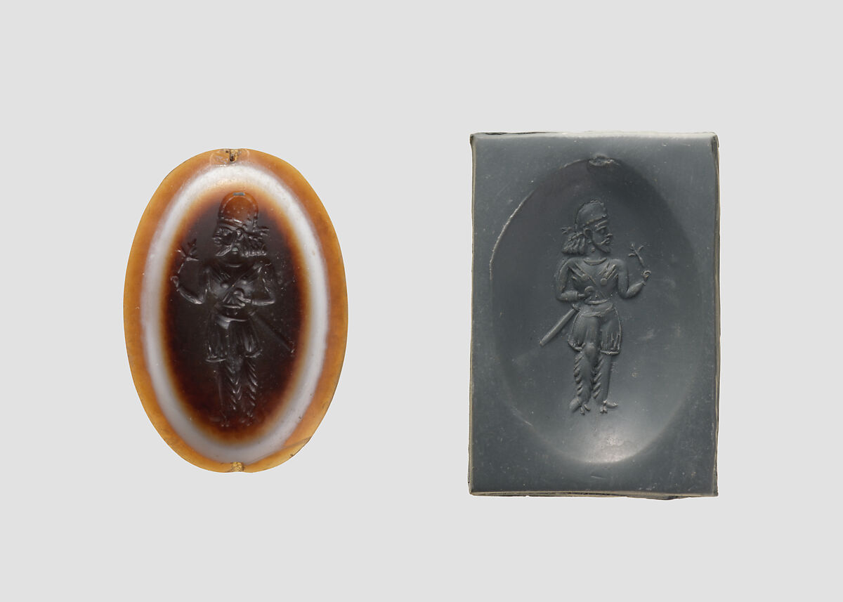 Stamp seal: standing noble holding a flower, Sardonyx, Sasanian