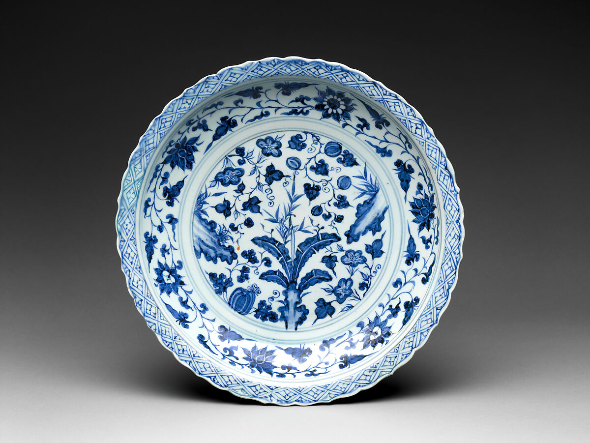 Foliated plate with rocks, plants, and melons

, Porcelain painted in underglaze cobalt blue (Jingdezhen ware), China