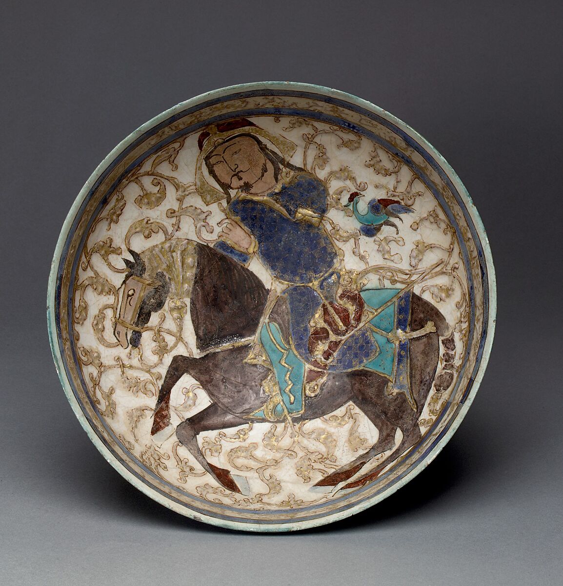Bowl with Prince on Horseback, Stonepaste; applied decoration, polychrome inglaze and overglaze painted and gilded on opaque monochrome glaze (mina'i)